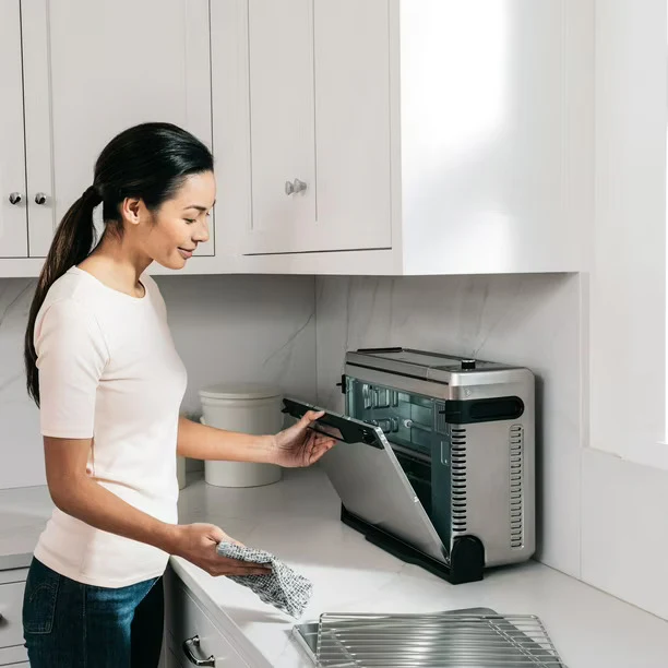 Ninja SP100 Digital Air Fry Countertop Oven with 6-in-1 Functionality, Flip Up & Away Capability for Storage Space, with Air Fry Basket, Wire Rack & Crumb Tray, Silver - Image 8